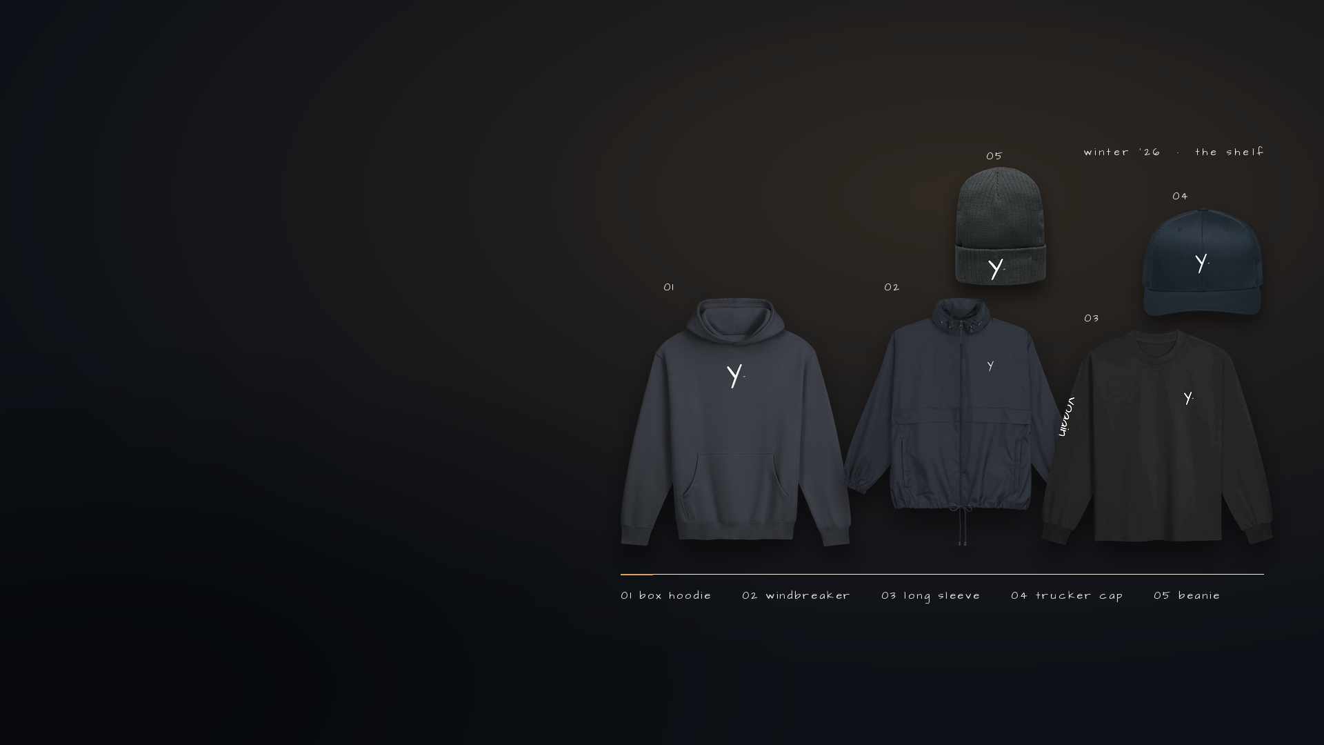 the yoggin line laid out on the dark: 01 box hoodie, 02 windbreaker, 03 long sleeve, 04 trucker cap, 05 beanie